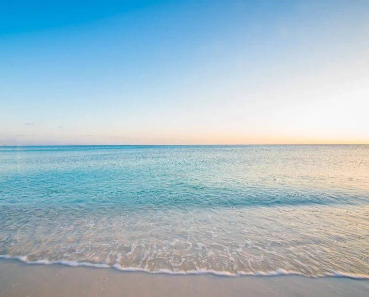 An image of a calm sea, symbolizing the serenity and balance that Ocean's Breeze Counselling in Plymouth, Devon, helps clients achieve through therapy.